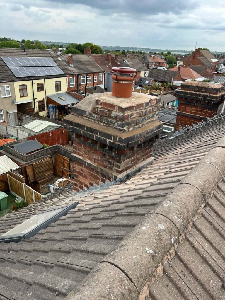 This is a photo taken from a roof which is being repaired by MCM Roofing Repairs Salisbury, it shows a street of houses, and their roofs